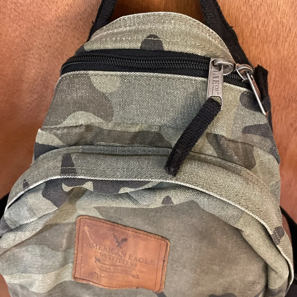 American Eagle Green Black  Camo Canvas Backpack Cinch Up back Multi Pockets